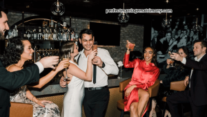 Elegant cocktail attire for men and women, featuring a stylish cocktail dress and a tailored suit.
